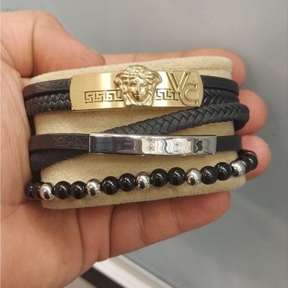 دستبند چرمی قفل و پلاک استیل مردانه طرح مهره ای کیفیت چرم عالی تنوع طرح رنگ ثابت کد bn (پس کرایه)