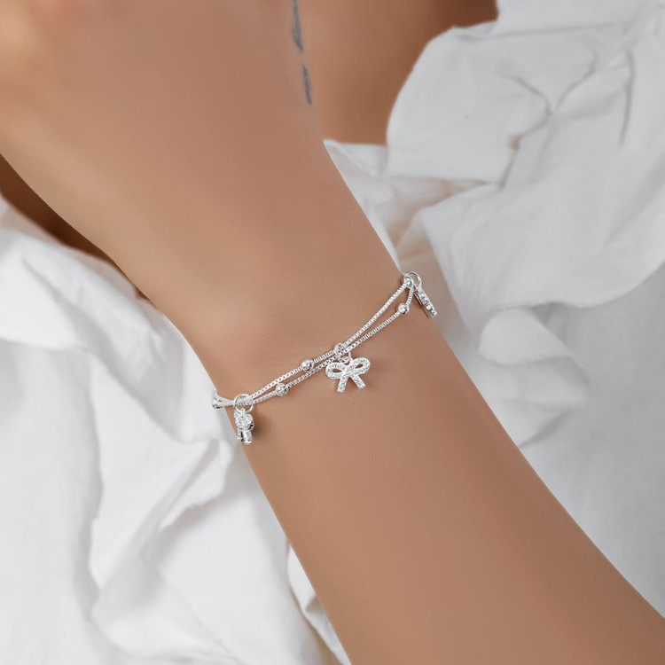 دستبند آبکاری نقره زنانه طرح پروانه آویز و گوی دو لاین تنوع طرح رنگ ثابت کد mp