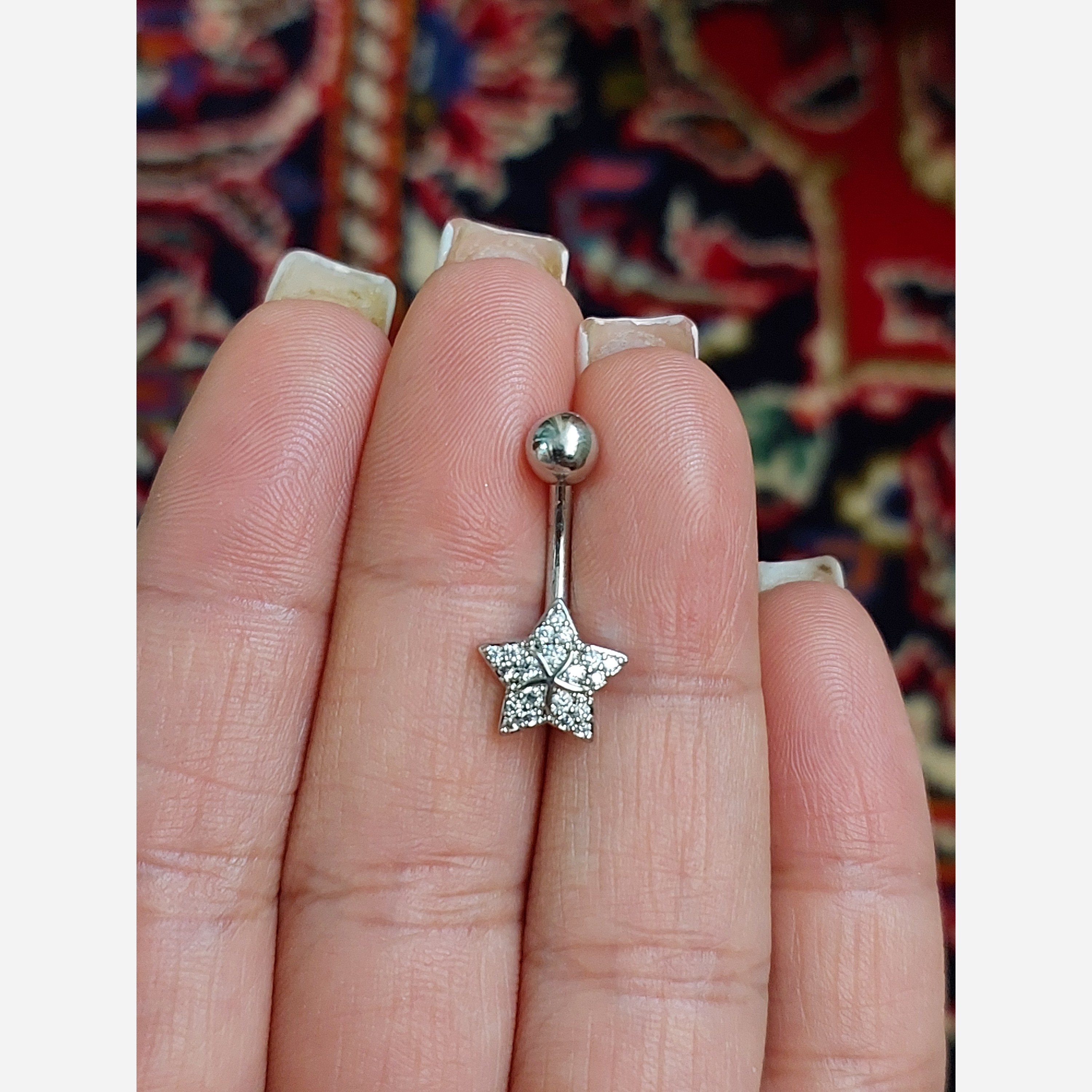 پیرسینگ ناف طرح ستاره